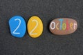 22 October,ÃÂ calendar date composed with multi colored stones over beach sand Royalty Free Stock Photo